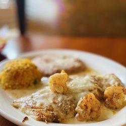 Alejandro's Mexican Restaurant - Grilled Mahi Mahi & Shrimp in a creamy cheese sauce with the most incredible rice & beans. Superb OuiOui :).,,