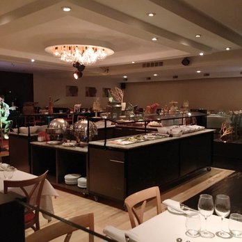 Rodeo Brazilian Steakhouse - Buffet station in the middle of the restaurant - Steakhouses Near Me - Toronto, Ontario Rodeo Brazilian Steakhouse - Buffet station in the middle of the restaurant - Steakhouses Near Me - Toronto, Ontario
