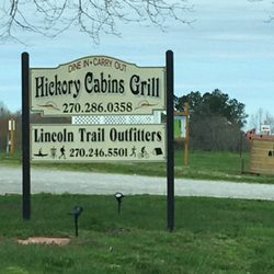 Hickory Cabins Grill - Front signage with next door Lincoln Trail Outfitters