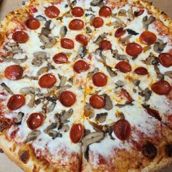 Black Stone Pizza - Mushroom and pep fresh outta the oven