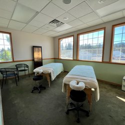 The Retreat Salon + Day Spa - Couples Massage room. One of our many massage rooms. Has an in room shower for body treatments!