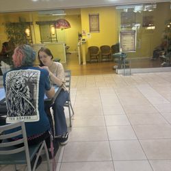 Oriental Chi - The store front of this business facing the food court