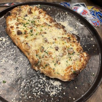 All' Assassina - GARLIC-CHEESE FLATBREAD - Italian Near Me - Union, New Jersey