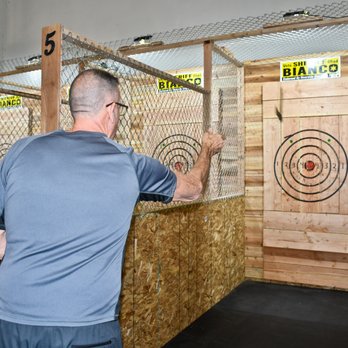 Riverside Indoor Shooting Range - An Axe captured by my camera in mid-air going toward the target - Archery Near Me - Riverside, California Riverside Indoor Shooting Range - An Axe captured by my camera in mid-air going toward the target - Archery Near Me - Riverside, California