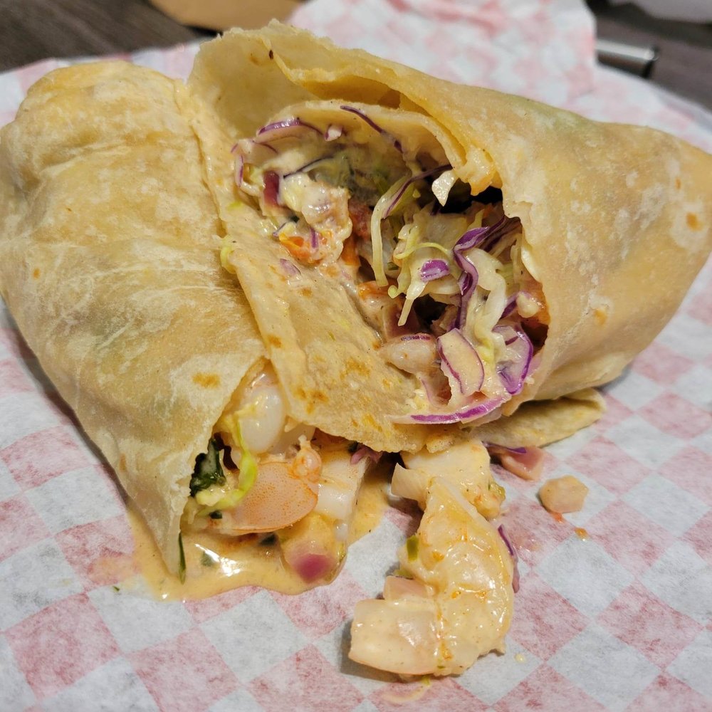 Rosie's Taco Shop - Cross-section of the shrimp burrito. - Fast Food Near Me - Gilbert, Arizona Rosie's Taco Shop - Cross-section of the shrimp burrito. - Fast Food Near Me - Gilbert, Arizona