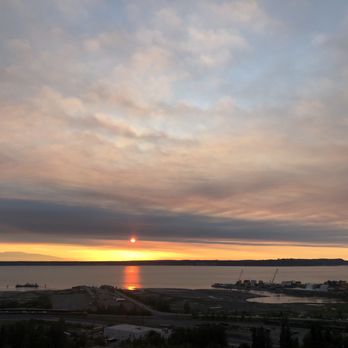Hilton Anchorage - From East Tower 15th floor viewing deck in the summer at 10-11pm - Hotels Near Me - Anchorage, Alaska Hilton Anchorage - From East Tower 15th floor viewing deck in the summer at 10-11pm - Hotels Near Me - Anchorage, Alaska