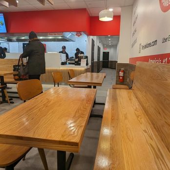 Teriyaki One - a man sitting at a table in a restaurant - Japanese Near Me - Brooklyn, New York