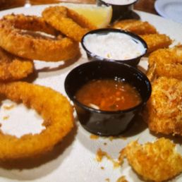 Six huge coconut shrimp and onion rings with both ranch and a sweet chili sauce.