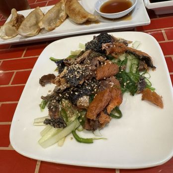 Matsu - Top: Chicken Gyoza Bottom: Salmon Skin Seaweed Salad - Sushi Bars Near Me - Houston, Texas