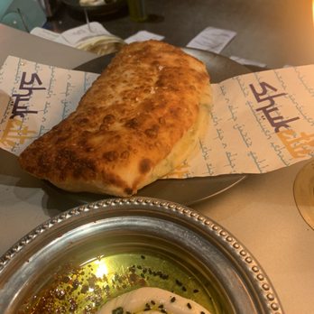 Shukette - Potato bread and cheese - Middle Eastern Near Me - New York, New York Shukette - Potato bread and cheese - Middle Eastern Near Me - New York, New York