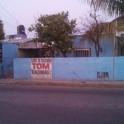 Taller De Bicicletas Tom - Fachada Tom
