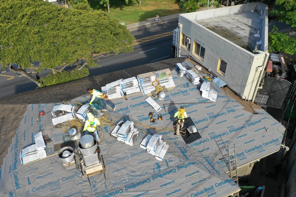 Slide of AL Roofing & RainGutters