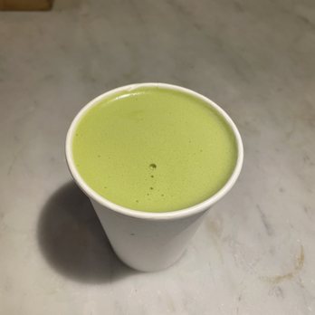 American Provisions - a cup of matcha on a table - Cheese Shops Near Me - South Boston, Massachusetts American Provisions - a cup of matcha on a table - Cheese Shops Near Me - South Boston, Massachusetts