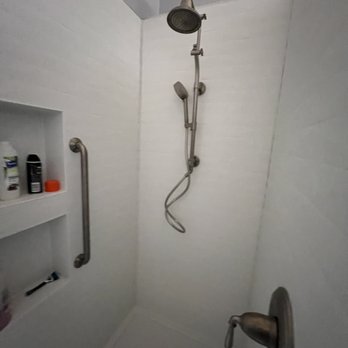 Pacific Bath - The new install with dual shower heads, safety bars, insets for soaps ets and water handle at the entry. - General Contractors Near Me - Phoenix, Arizona Pacific Bath - The new install with dual shower heads, safety bars, insets for soaps ets and water handle at the entry. - General Contractors Near Me - Phoenix, Arizona