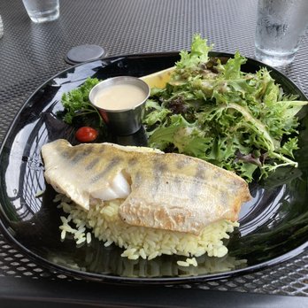 Chez Pineault - a plate of food on a table - French Near Me - Baie-Saint-Paul, Quebec Chez Pineault - a plate of food on a table - French Near Me - Baie-Saint-Paul, Quebec
