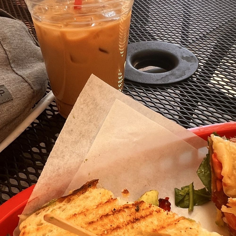 Breakfast panini. Lots of avocado, spinach very fresh. Cold latte.