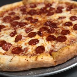 LG's Pizzeria And Pub - Introducing our pizza!