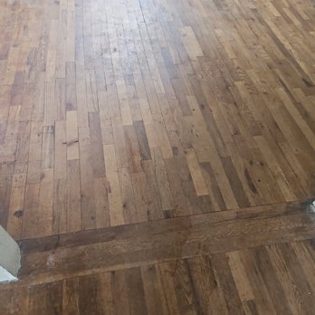 Elite Quality Construction - Before - dirty and stained hardwoods - General Contractors Near Me