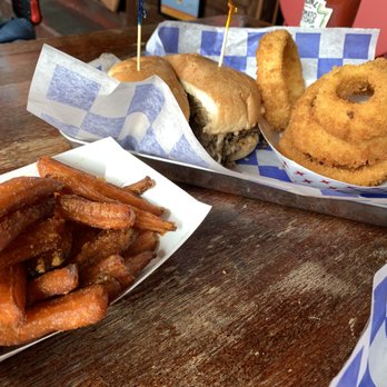 Hubcap Grill - Galveston - Philly cheesesteak Burger, onion rings, and sweet potato fries. - Burgers Near Me - Galveston, Texas