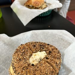 New York Bagels - Whole wheat everything toasted with jalapeño cream cheese, egg and bacon