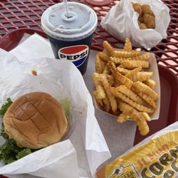 Single cheeseburger combo, tater tots, corn dog Single cheeseburger combo, tater tots, corn dog