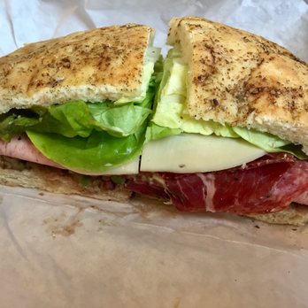 The Sentinel - Muffaletta Sandwich with Coppa, Mortadella, Capicola, Green Olive Relish, and Provolone Cheese - Sandwiches Near Me - San Francisco, California