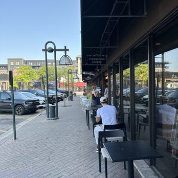 Starbucks - people sitting at tables outside a coffee shop - Coffee & Tea Near Me - Edina, Minnesota Starbucks - people sitting at tables outside a coffee shop - Coffee & Tea Near Me - Edina, Minnesota