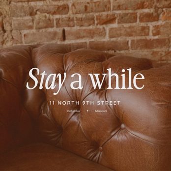 Sage - a brown leather couch with a brick wall in the background - Coffee & Tea Near Me - Columbia, Missouri Sage - a brown leather couch with a brick wall in the background - Coffee & Tea Near Me - Columbia, Missouri