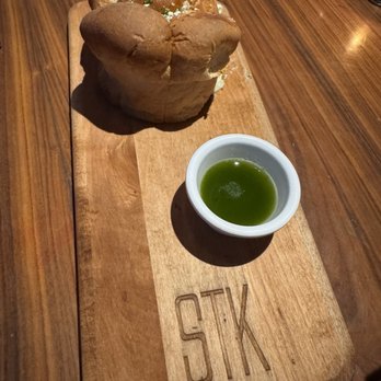 STK Steakhouse - Bread was delicious ! Gorgonzola topped with a side of some type of yummy oil. - Steakhouses Near Me - Orlando, Florida STK Steakhouse - Bread was delicious ! Gorgonzola topped with a side of some type of yummy oil. - Steakhouses Near Me - Orlando, Florida
