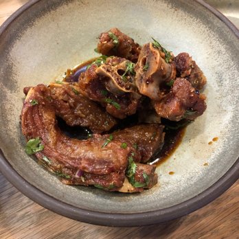 Llama Inn - Pig tail. I would have never ordered these but they came highly recommended. Just step outside your comfort zone and DO IT. - Peruvian Near Me - Brooklyn, New York