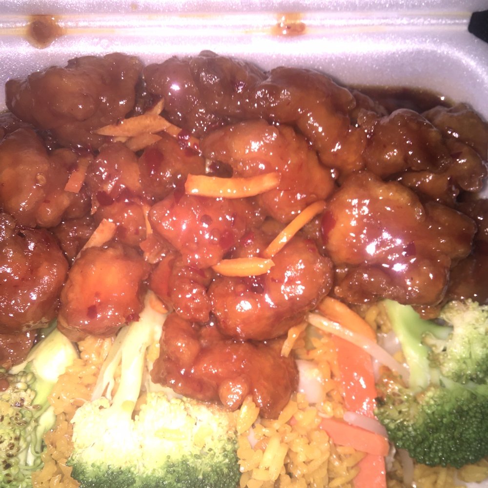 Orange chicken combination with vegetable fried rice. Egg roll not pictured. Vegetable Fried Rice Chicken W. Orange Flavored Orange chicken combination with vegetable fried rice. Egg roll not pictured. Vegetable Fried Rice Chicken W. Orange Flavored