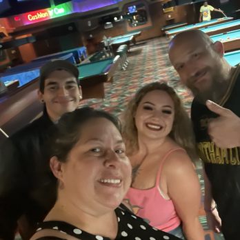 Snooker's Pool & Pub - a group of people posing for a picture - Pool Halls Near Me - Livonia, Michigan
