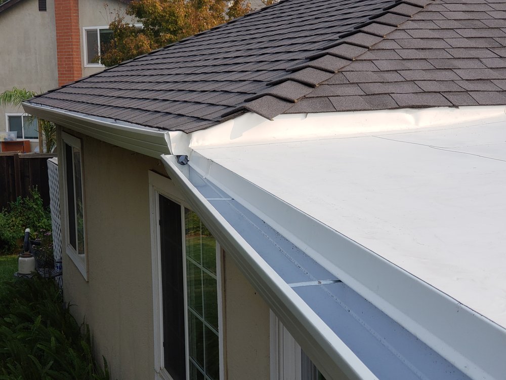 Slide of Trinity Roofing