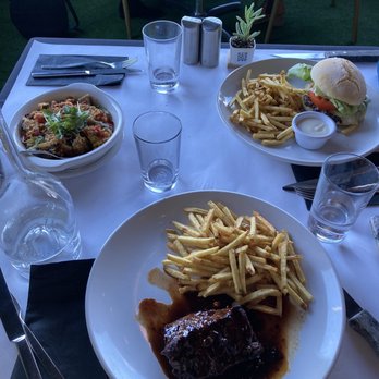 Le Garage - Bavette, 1/2 lbs grass fed beef burger, and Ratatouille Provenal - French Near Me - Sausalito, California Le Garage - Bavette, 1/2 lbs grass fed beef burger, and Ratatouille Provenal - French Near Me - Sausalito, California