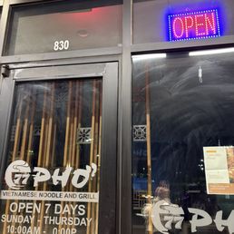 OPEN sign lit up nice and bright while the inside is dark as my mood after seeing this place was closed already.