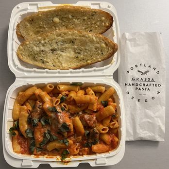 Grassa - Rigatoni and garlic bread with cheese (add on) - Italian Near Me - Portland, Oregon Grassa - Rigatoni and garlic bread with cheese (add on) - Italian Near Me - Portland, Oregon