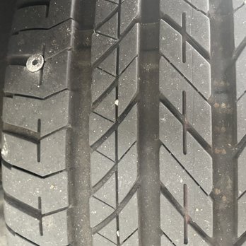 Courtesy Tire - Screw in the tire tread that they were able to repair. - Tires Near Me - Seattle, Washington