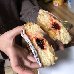 Jelly filled Frosted donut Jelly filled Frosted donut