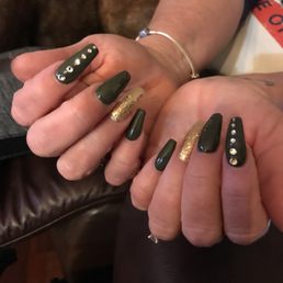 Dark green with gold. Coffin Shaped.