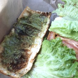 a sandwich with lettuce and meat