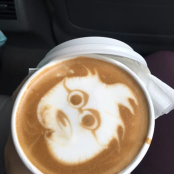 Moore Coffee Shop - Cute latte art in a small to go cup! - Coffee & Tea Near Me - Seattle, Washington