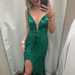 Lee's Alterations - This dress was 4 sizes too big, i dropped it off at Lee's and they made it look absolutely perfect even with the tough stones all over it!!
