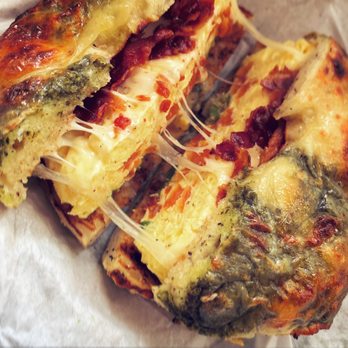 Posh Bagel - Pesto Bagel with eggs, bacon, Swiss cheese (modified Eggwich Supreme) - Bagels Near Me - Los Gatos, California