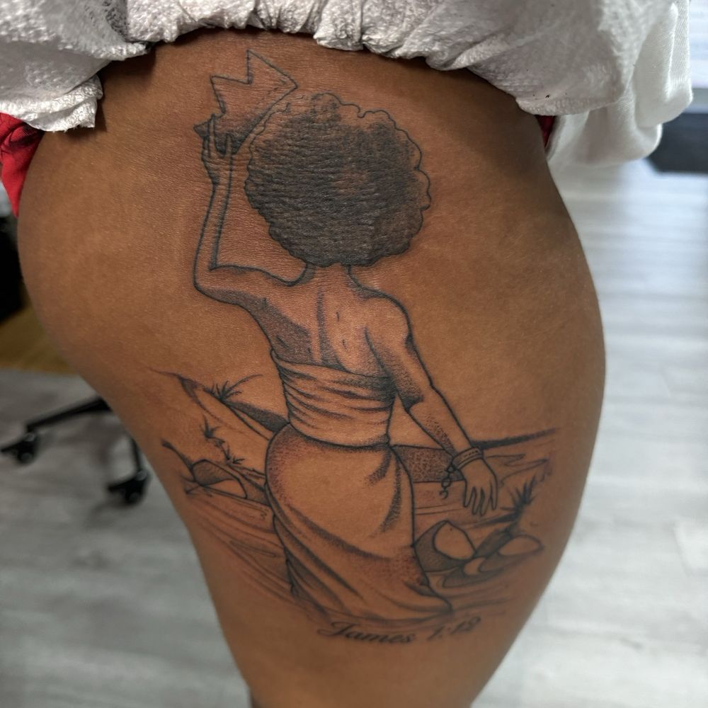 Dragoncat Tattoo - Black woman tattoo on right outer thigh. - Tattoo Near Me - Pensacola, Florida Dragoncat Tattoo - Black woman tattoo on right outer thigh. - Tattoo Near Me - Pensacola, Florida