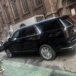 Luxury Cadillac Escalade ESV providing executive chauffeur service in Manhattan, NYC.