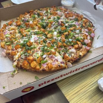 Pizza Twist - Chicken Tikka Masala pizza - Pizza Near Me - Queens, New York Pizza Twist - Chicken Tikka Masala pizza - Pizza Near Me - Queens, New York