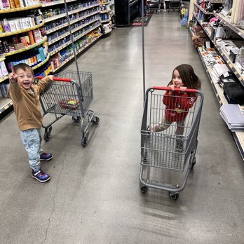 Grocery Outlet - two children pushing a shopping cart - Grocery Near Me - Beaumont, California