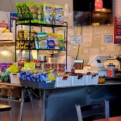 Nanay Gloria's - Next to the drinks refrigerator is the cash register.