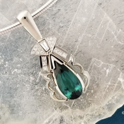 Satterlee Jewelry Repair & Design Center - Custom designed & built 14k white gold pendant set with a gorgeous Indicolite Tourmaline and natural Diamonds
