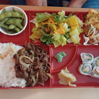 Aroma Korea - Bulgogi bento with sides of edamame, gyoza, takoyaki, puchingae, and Cali roll. - Korean Near Me - Cary, North Carolina Aroma Korea - Bulgogi bento with sides of edamame, gyoza, takoyaki, puchingae, and Cali roll. - Korean Near Me - Cary, North Carolina